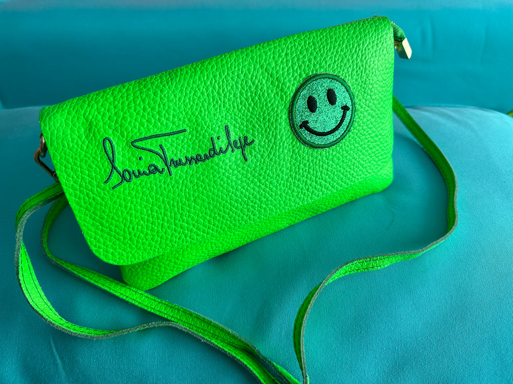 
                  
                    Smiley Leather Flap Clutch + Crossbody Bag in Neon Green
                  
                